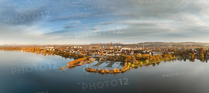 Aerial panorama of the town of Radolfzell on Lake Constance in autumnal vegetation with the Waeschbruckhafen