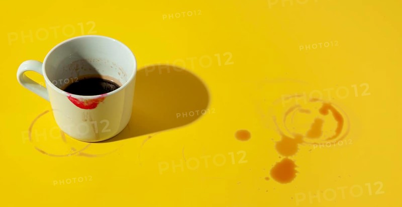 Cup coffee stained with lipstick
