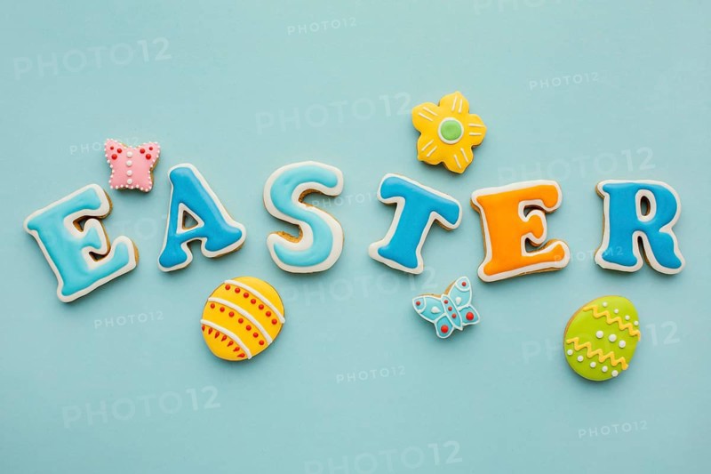 Flat lay easter eggs with flower butterfly shapes