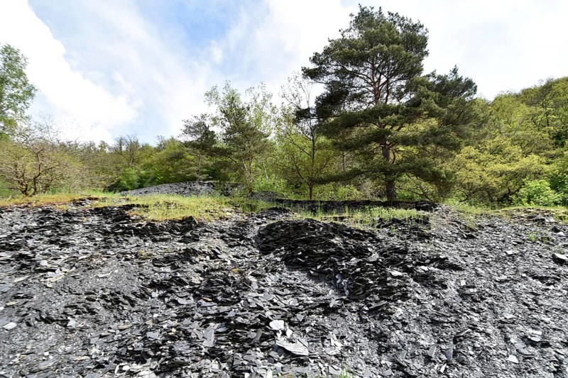 Disused slate mine with overburden in the valley of the Kyrbach near Oberkirn in Hunsrueck