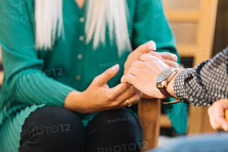 Close up couple holding each other s hand