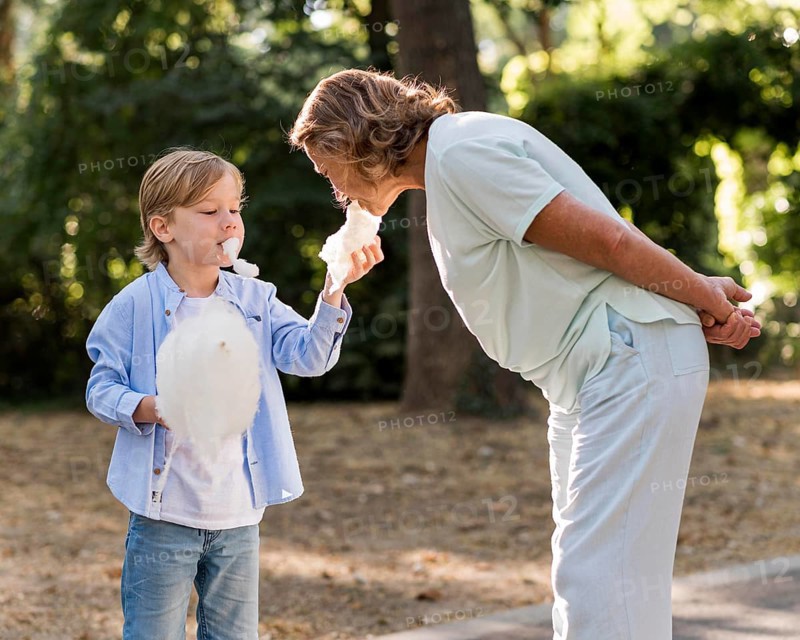 Medium shot grandma eating cotton candy