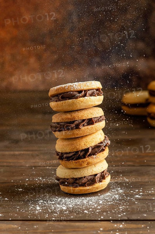 Biscuits with cream wooden table