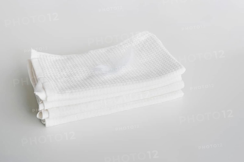 High view stacked white towels