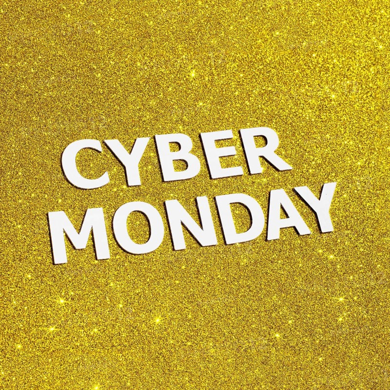 Flat lay golden glitter cyber monday