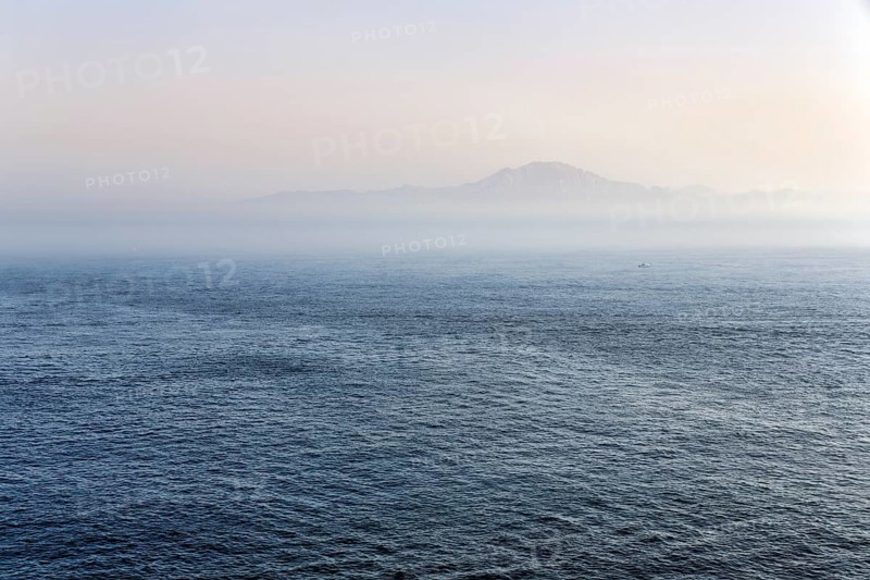 View of the coast of Morocco on the horizon