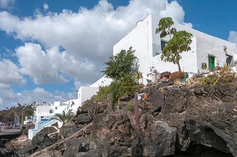 Typical white houses on the promenade of Puerto del Carmen