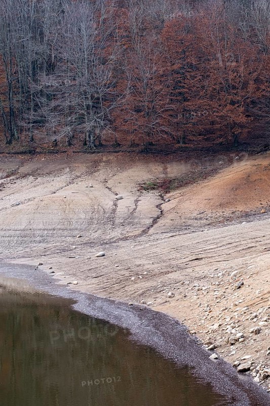 Desolate landscape of drought in the Santa Fe reservoir in the Montseny Biosphere Reserve in the province of Barcelona in Spain