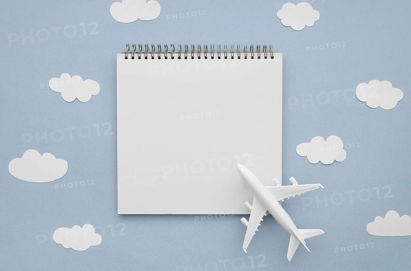 Frame clouds with airplane notebook