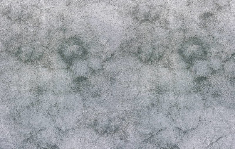 Texture of a gray wall. Old wall with cracked texture. Cracked cement wall background. Textured and cracked wall. Textured old wall background