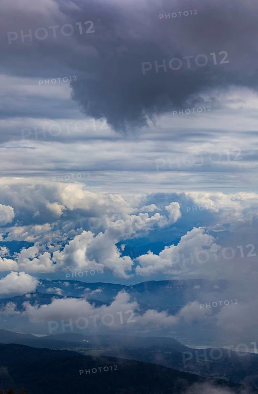 Dramatic cloudy sky on the Gerlitzen with a view of the Klagenfurt basin