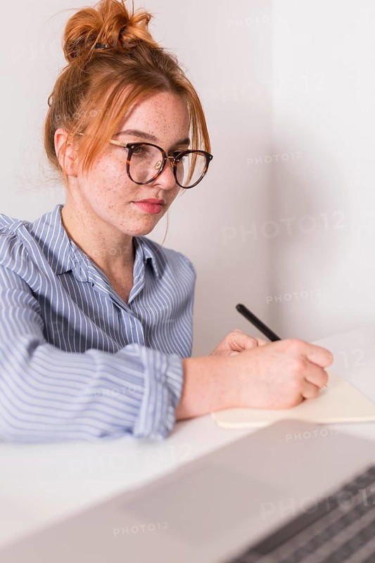 Female teacher paying attention students during online class
