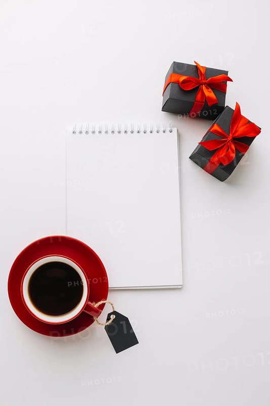 Black friday notebook mock up with coffee