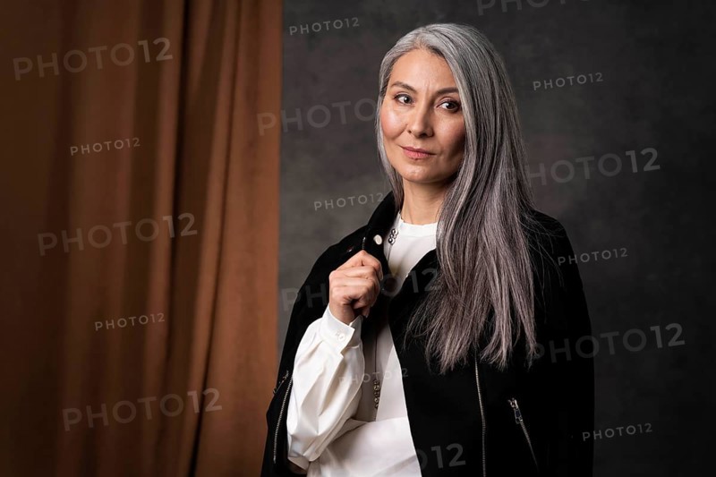 Beautiful senior woman portrait wearing black jacket 2