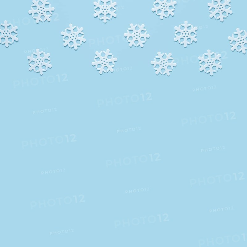 Snowflake baby blue background with copy space