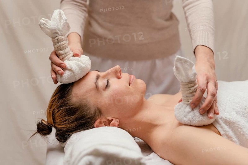 Close up therapist holding wet towels