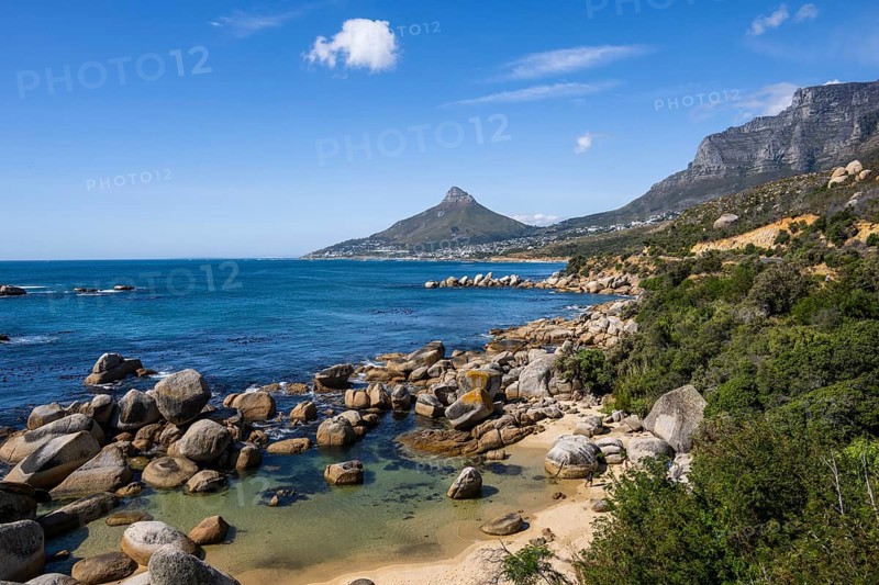 Atlantic Ocean with Lion's head and Table Mountain from Llandudno beachCape Town