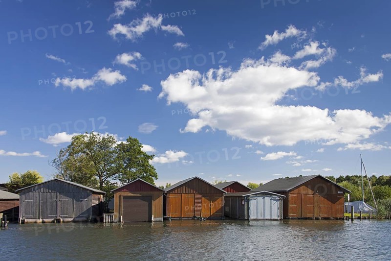 Wooden boat houses on the banks of the Plauer See at Plau am See
