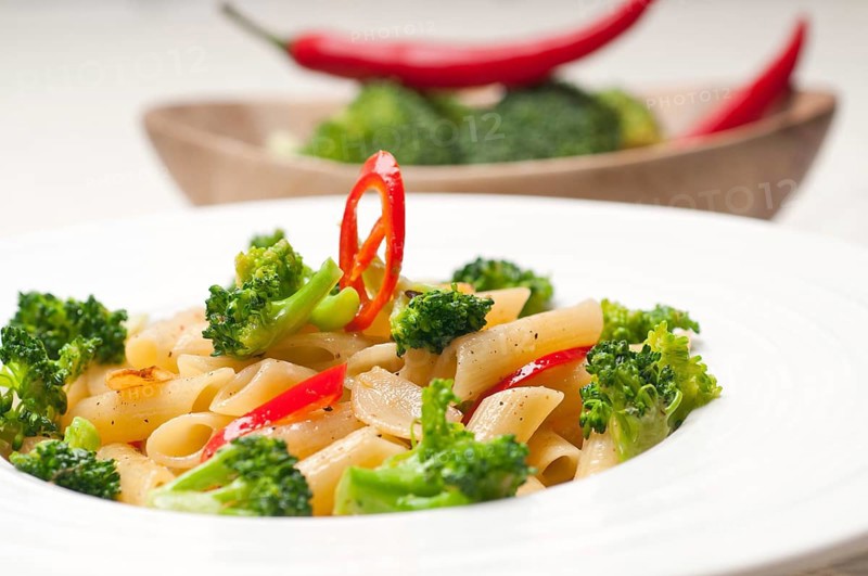 Classic Italian penne pasta with broccoli and red chili pepper