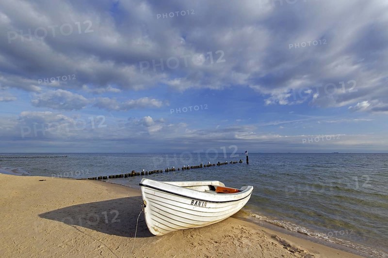 White fishing boat in the dunes along the Baltic Sea at Bansin