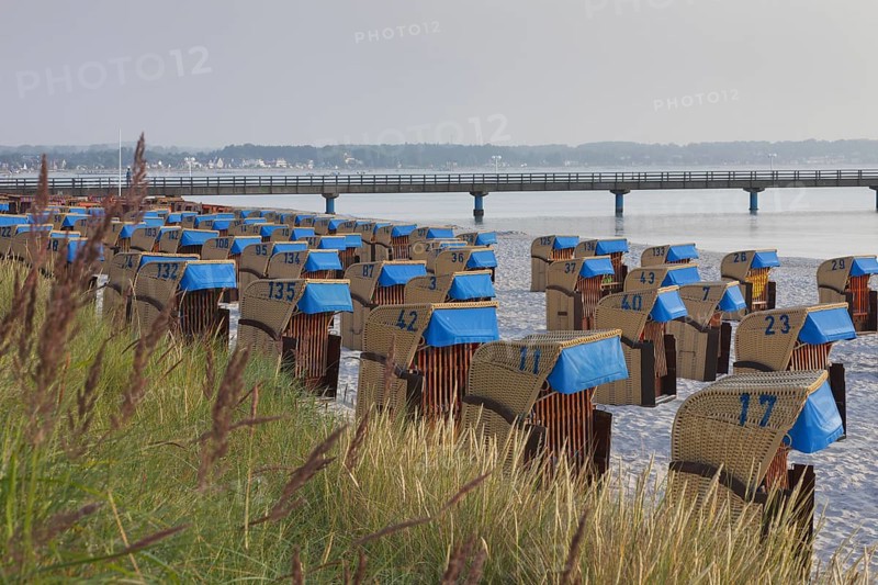 Roofed wicker beach chairs along the Baltic Sea at Scharbeutz