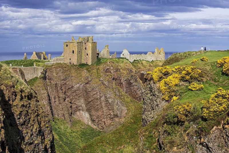 Tourists looking at Dunnottar Castle