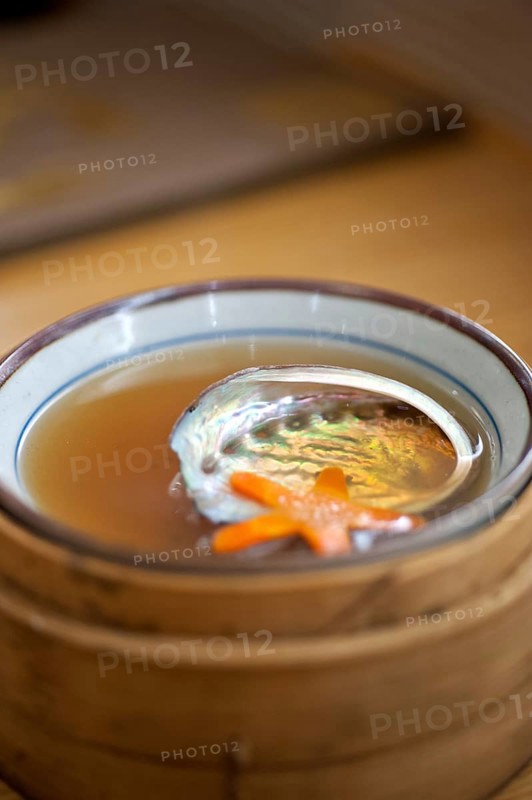 Japanese style abalone soup empty shell on bamboo bowl set holder