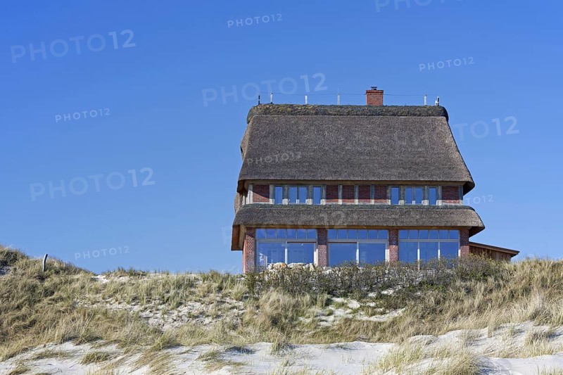 Villa with thatched roof in the dunes at Wittduen auf Amrum on the island of Amrum