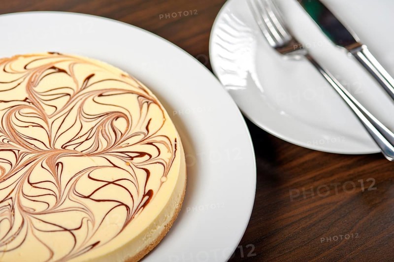 Fresh baked classic Cheese cake with chocolate topping