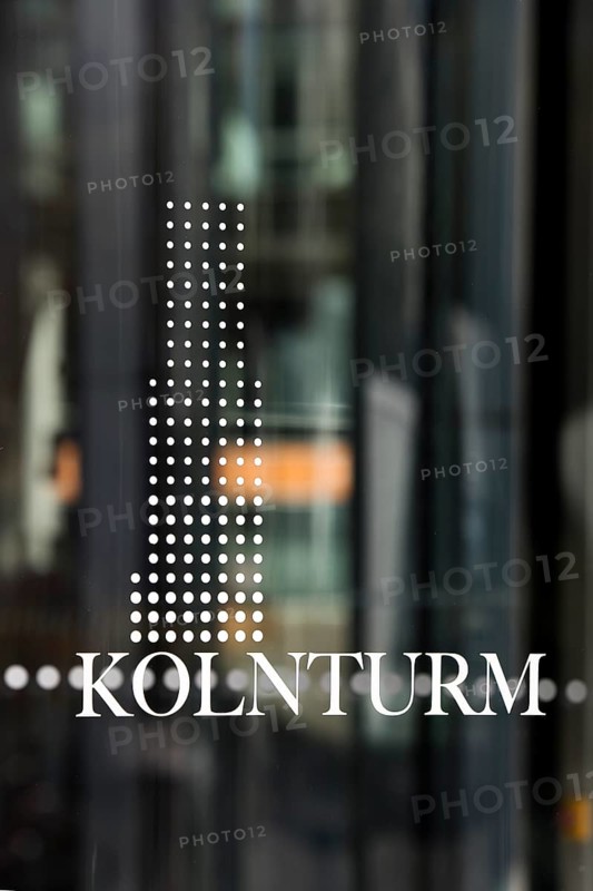 Cologne Tower lettering in the glass entrance door