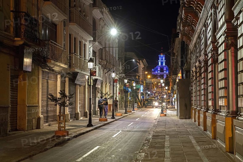 Street with colonial houses at night at Tarija