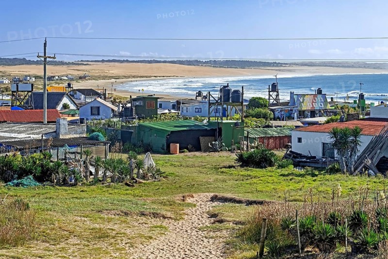Colourful houses in the hamlet Cabo Polonio along the Atlantic Ocean coast