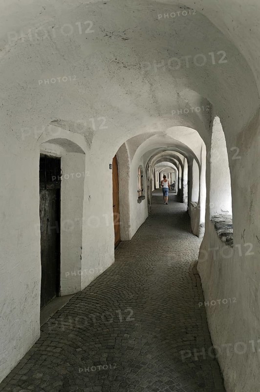Arcade covered sidewalk pavement along the Laubengasse at Glorenza