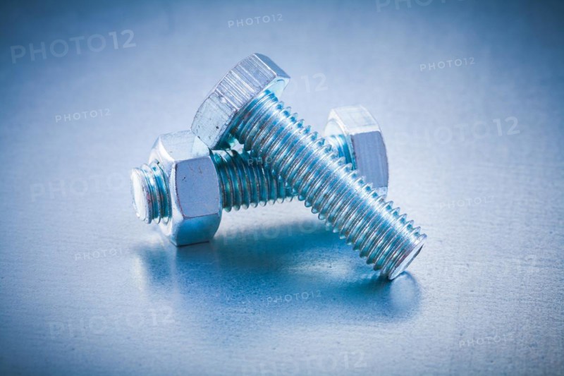 Metal bolt Details with screw nut on metallic background Construction concept