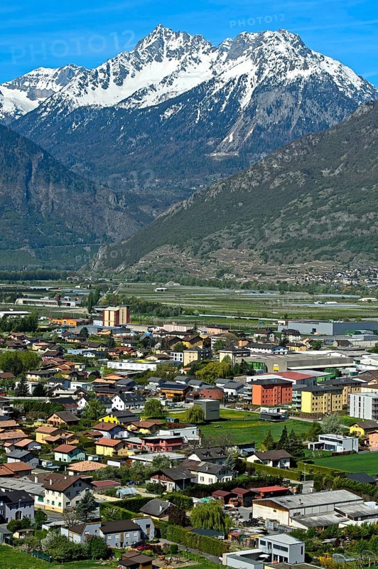 The village of Charrat in the wide Rhone valley in Lower Valais