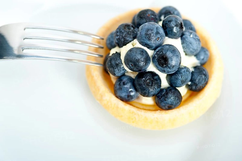 Fresh blueberry cream cupcake homemade closeup macro
