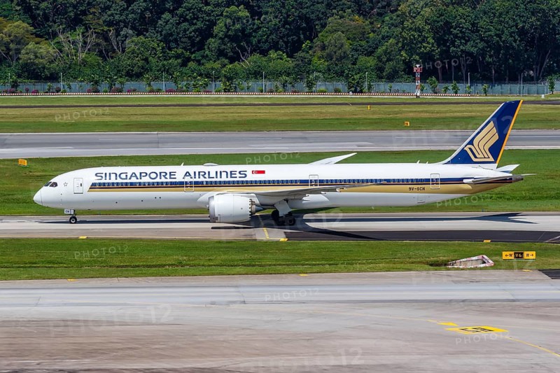 A Boeing 787-10 Dreamliner aircraft of Singapore Airlines with the registration 9V-SCN at Changi Airport
