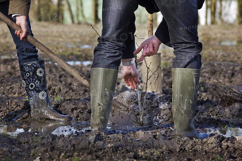 Man wearing rubber boots