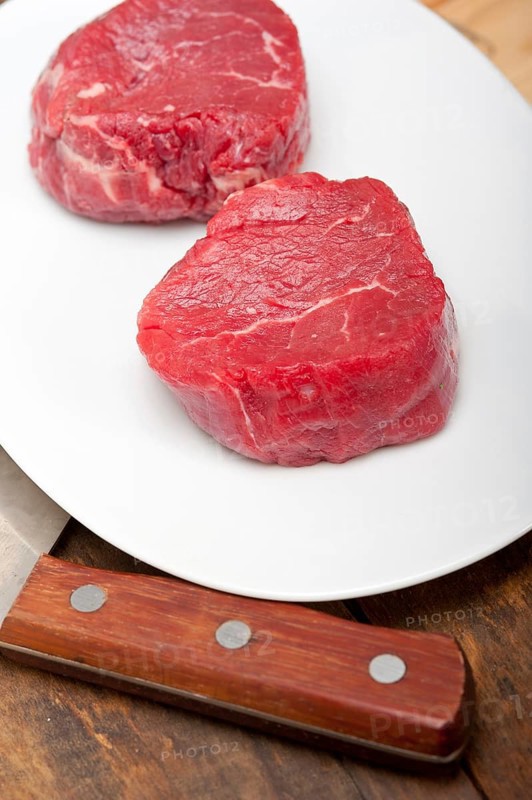 Fresh raw beef filet mignon cut ready to cook