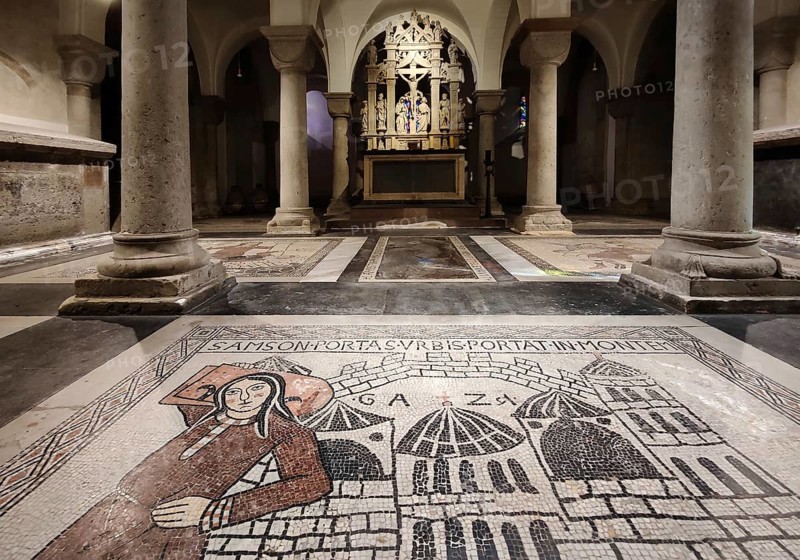 Medieval floor mosaic with Renaissance altar in the crypt