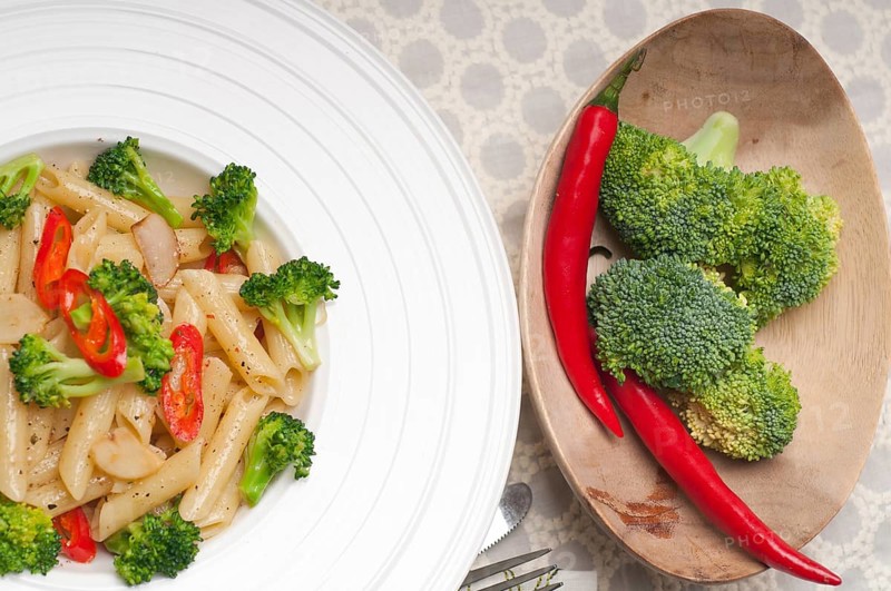 Classic Italian penne pasta with broccoli and red chili pepper
