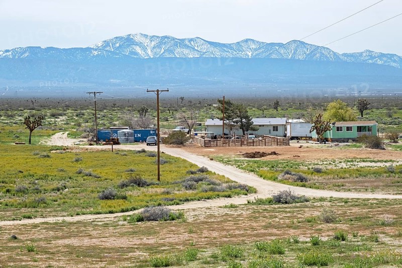 Small farm on the countryside in front of the San Gabriel Mountains