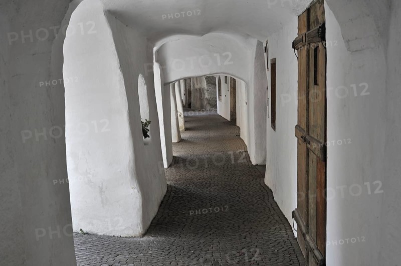 Arcade covered sidewalk pavement along the Laubengasse at Glorenza
