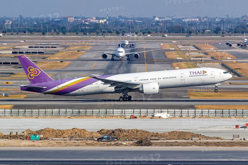 A Thai Airways Boeing 777-300ER aircraft with the registration HS-TKP at Bangkok Suvarnabhumi Airport