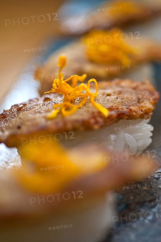 Japanese style sushi fried goose liver macro closeup