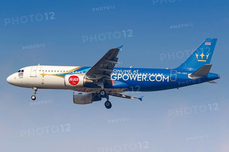 A Thai AirAsia Airbus A320 aircraft with the registration HS-ABX and the King Power special livery at Bangkok Don Mueang Airport