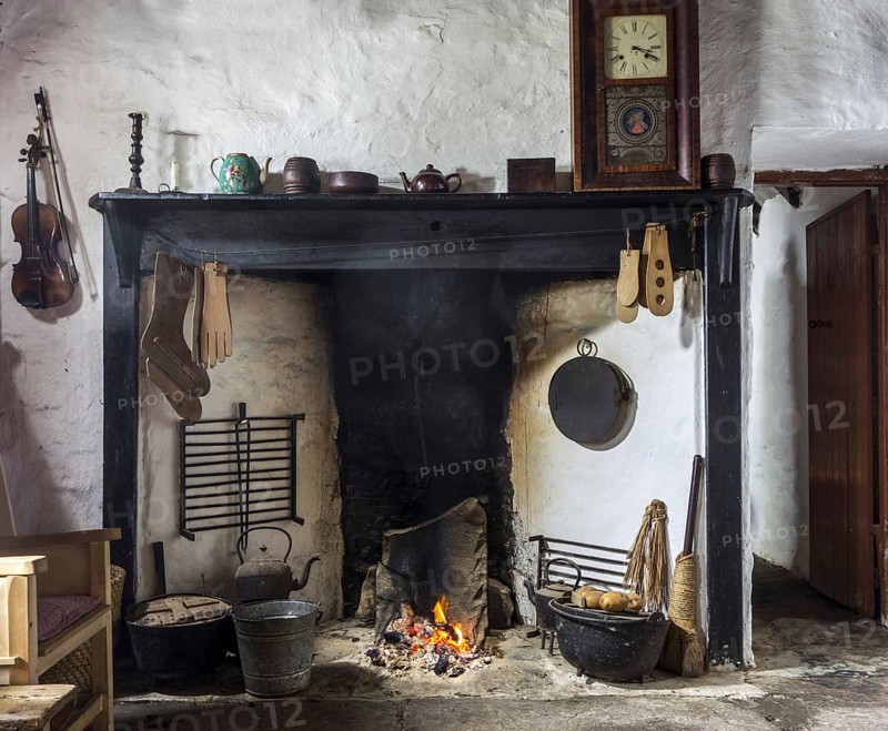 Peat fire burning in fireplace at the Croft House Museum