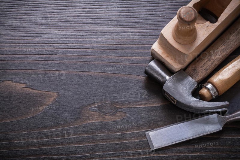 Copy space image of carpenter's tools on vintage wooden board construction concept