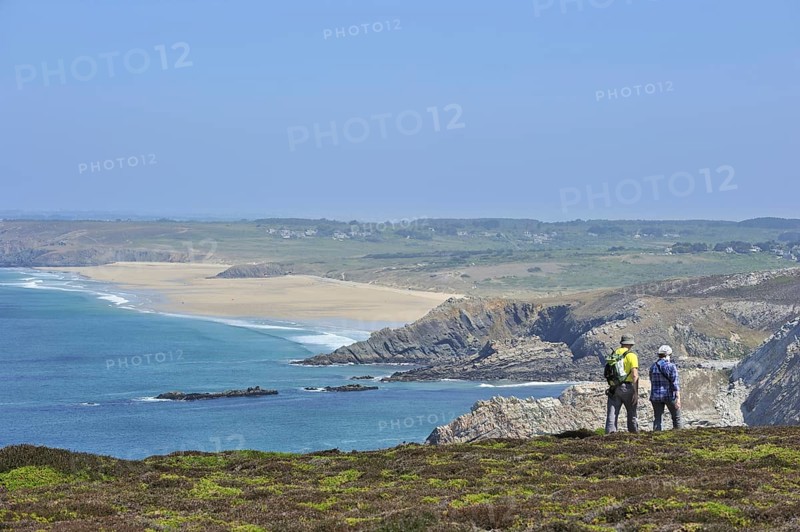 Hikers following trail along the Cap de la Chevre