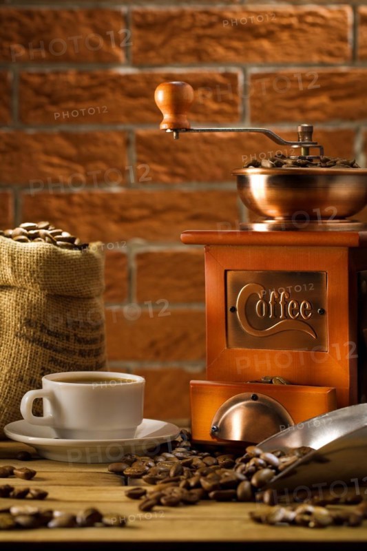 Composition of coffee on the brick wall